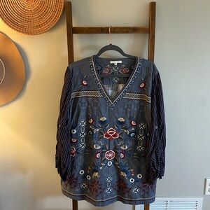 Women’s John Mark flowy and embroidered blouse.